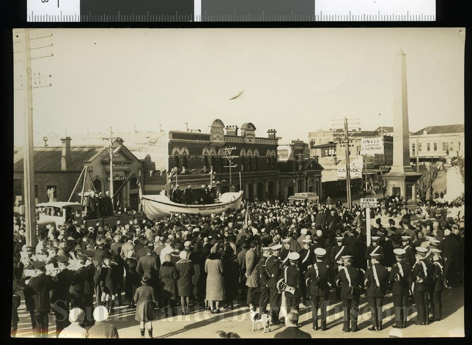 Crowds at the Benvenue Memorial in Sophia St Timaru for the 50th anniversary of the wreck of the Benvenue dated 14th May 1932 In the with the lifeboat Alexandra South Canterbury Museum