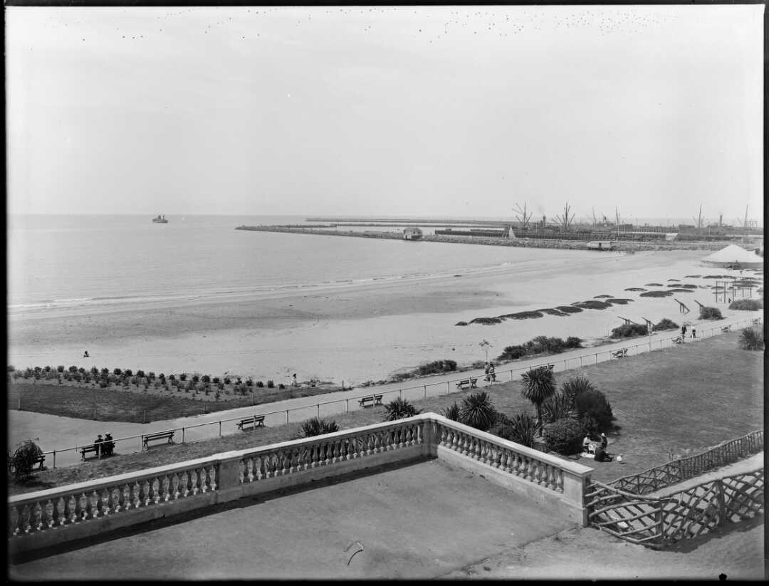 1910 Caroline Bay Beach area Timaru with wharf in distance nlnzimage